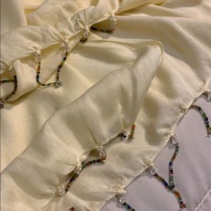 Cream colored scarf with beads